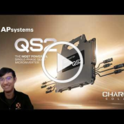Video thumbnail showing APsystems QS2 microinverter with multiple cables, a smiling presenter on the left, and Charge Solar branding; click to play